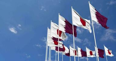 Japan and Qatar Flags Waving Together in the Sky, Seamless Loop in Wind, Space on Left Side for Design or Information, 3D Rendering video