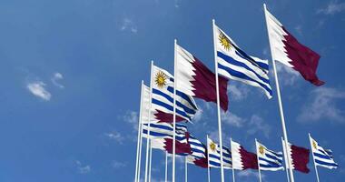 Uruguay and Qatar Flags Waving Together in the Sky, Seamless Loop in Wind, Space on Left Side for Design or Information, 3D Rendering video
