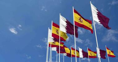 Spain and Qatar Flags Waving Together in the Sky, Seamless Loop in Wind, Space on Left Side for Design or Information, 3D Rendering video