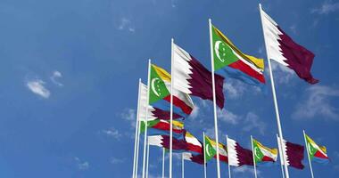 Qatar and Comoros Flags Waving Together in the Sky, Seamless Loop in Wind, Space on Left Side for Design or Information, 3D Rendering video