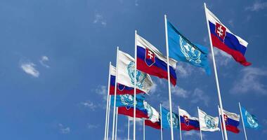 Slovakia and United Nations, UN Flags Waving Together in the Sky, Seamless Loop in Wind, Space on Left Side for Design or Information, 3D Rendering video