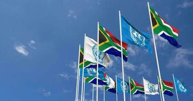 South Africa and United Nations, UN Flags Waving Together in the Sky, Seamless Loop in Wind, Space on Left Side for Design or Information, 3D Rendering video