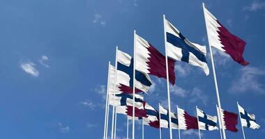 Finland and Qatar Flags Waving Together in the Sky, Seamless Loop in Wind, Space on Left Side for Design or Information, 3D Rendering video