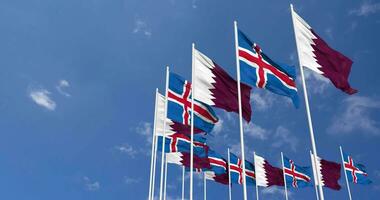Iceland and Qatar Flags Waving Together in the Sky, Seamless Loop in Wind, Space on Left Side for Design or Information, 3D Rendering video