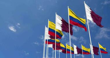 Colombie et Qatar drapeaux agitant ensemble dans le ciel, sans couture boucle dans vent, espace sur la gauche côté pour conception ou information, 3d le rendu video