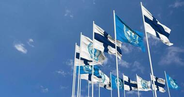 finland och förenad nationer, fn flaggor vinka tillsammans i de himmel, sömlös slinga i vind, Plats på vänster sida för design eller information, 3d tolkning video