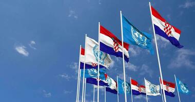 Croatia and United Nations, UN Flags Waving Together in the Sky, Seamless Loop in Wind, Space on Left Side for Design or Information, 3D Rendering video