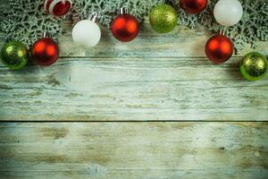 Christmas Ornaments on Vintage Wood Background photo