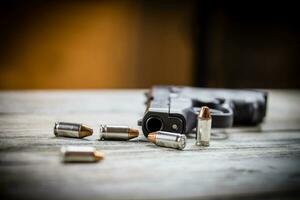 Pistol Handgun and Bullets photo