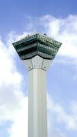 a tower with a blue sky in the background photo