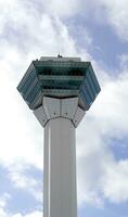 a tall tower with a blue sky photo