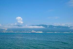 Seascape of the cement bay, Sea and mountains near photo