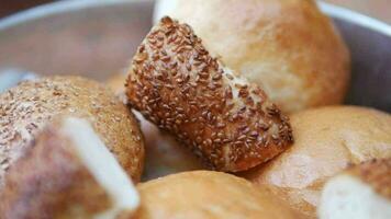 slow motion of hand pick Turkish Bagel Simit on table video