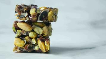 chocolate and pistachios protein bars on table video