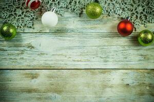 Christmas Ornaments on Vintage Wood Background photo