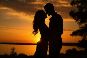 AI generated A silhouette of a couple embracing against the backdrop of a beautiful sunset photo