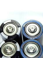 Salt and alkaline batteries, source of energy for portable technology. AAA and AA batteries photo