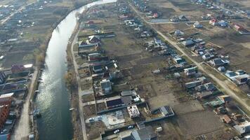 View from the top of the village. Streets without asphalt and single-storey houses. The Kuban village. photo