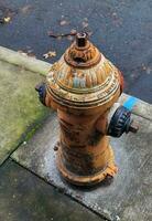 Fire hydrant stands tall on a city street in Portland, USA, symbolizing safety, emergency preparedness photo