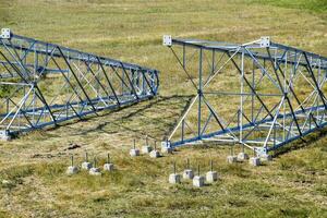 Assembled power transmission line supports, ready for installation photo