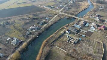 View from the top of the village. Streets without asphalt and single-storey houses. The Kuban village. photo