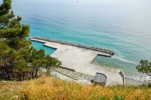 Concrete pier and sea pier on Black Sea, Breakwater at the concrete pier. photo