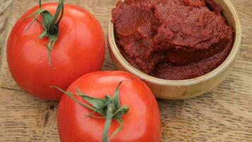 Tomato paste in a bowl. High quality 4k footage video