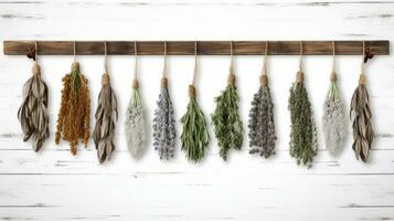 AI generated a collection of dried herbs hanging on a wooden rod against a white wooden background. photo