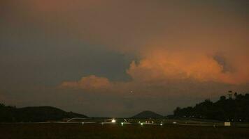 Dawn over the runway, airplane takeoff video