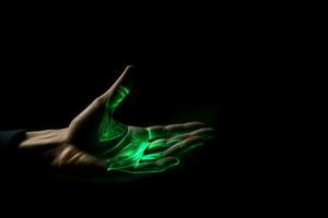 AI generated Green hologram of hand palm on black background. Generate ai photo