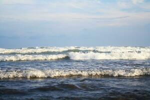 rolling beach waves photo