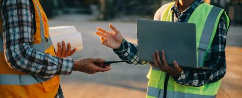 Team Construction or engineering group and worker. Teamwork and determination to succeed. Safety hard hat to prevent accident while working Transport and Container Team. Concept Restart and new Normal photo