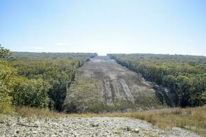 A clearing in the forest for the gas pipeline photo