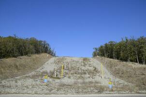 A clearing in the forest for the gas pipeline photo