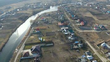 View from the top of the village. Streets without asphalt and single-storey houses. The Kuban village. photo