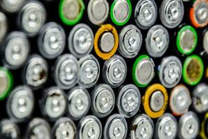 Salt and alkaline batteries, source of energy for portable technology. AAA and AA batteries photo