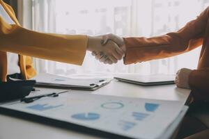 Team of business people working together in the meeting room office, teamwork background charts and graphs banner, double exposure successful teamwork,business planning concept. photo