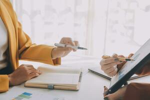 Team of business people working together in the meeting room office, teamwork background charts and graphs banner, double exposure successful teamwork,business planning concept. photo