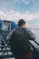 Happy attractive asian woman traveler with backpack at the modern airport terminal, copy space, Tourist journey trip concept photo