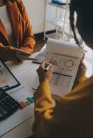 Team of business people working together in the meeting room office, teamwork background charts and graphs banner, double exposure successful teamwork,business planning concept. photo