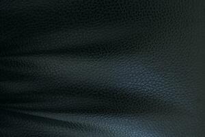 Black background. Leather car seat covers and sofas. photo