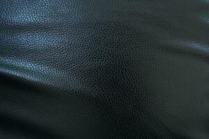 Black background. Leather car seat covers and sofas. photo