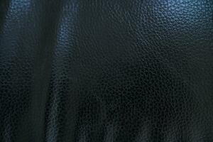 Black background. Leather car seat covers and sofas. photo