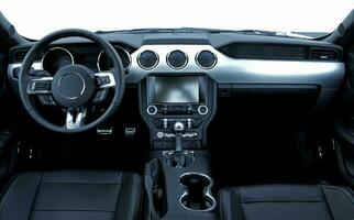 Buttons And Electronic Controls On A Front Panel Inside Modern Car photo