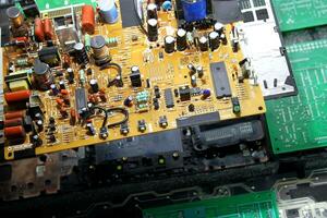 Repair Of Circuit Board With Microchips And Radio Components photo