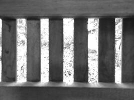 Photo of the air vents in my grandmother's house, black and white, similar to the ventilation in a prison