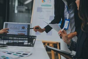 Close up ux developer and ui designer use augmented reality brainstorming about mobile app interface wireframe design on desk at modern office.Creative digital development agency photo