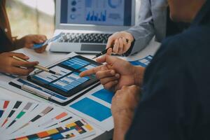 Close up ux developer and ui designer use augmented reality brainstorming about mobile app interface wireframe design on desk at modern office.Creative digital development agency photo