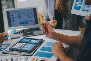 Close up ux developer and ui designer use augmented reality brainstorming about mobile app interface wireframe design on desk at modern office.Creative digital development agency photo
