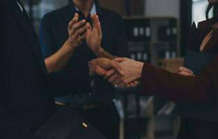 Business handshake for teamwork of business merger and acquisition,successful negotiate,hand shake,two businessman shake hand with partner to celebration partnership and business deal concept photo